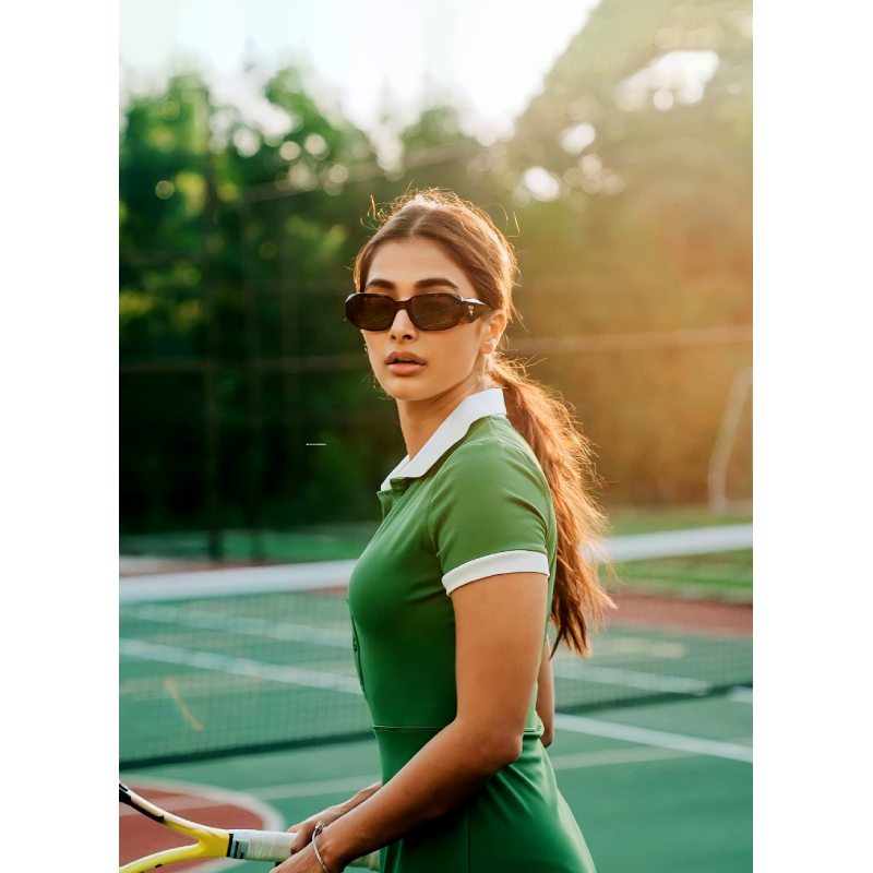 Pooja playng tennis
