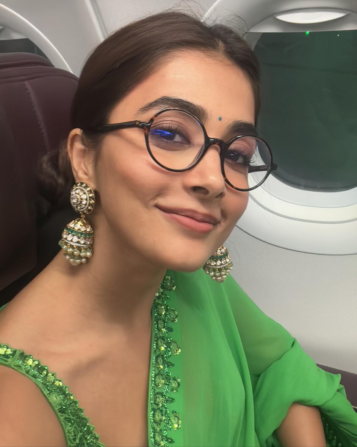 Pooja hegde in green saree clicks