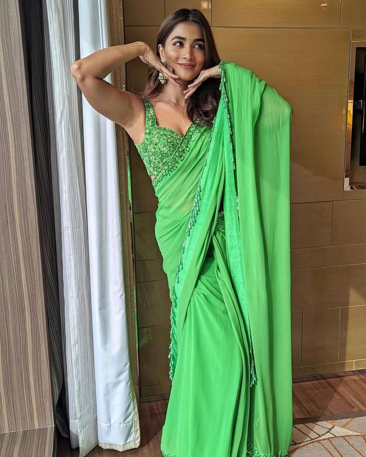 Pooja hegde in green saree clicks